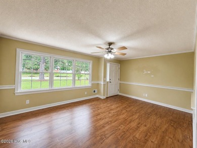 Charming 3-bedroom, 2-bath home located in the highly desirable - photo 4