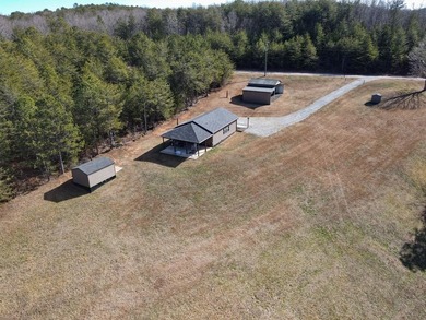 Welcome to this like new custom-built cottage where waterfront - photo 16
