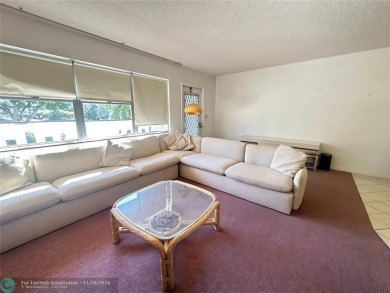 Lake Condo For Sale in Deerfield Beach, Florida