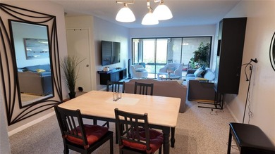 More than a condo, it's a waterfront lifestyle. Located in the - photo 4
