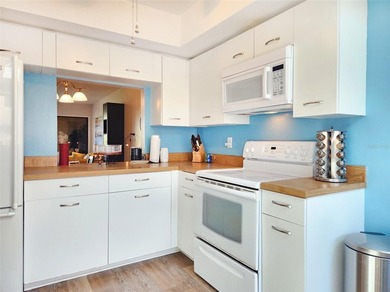 More than a condo, it's a waterfront lifestyle. Located in the - photo 7
