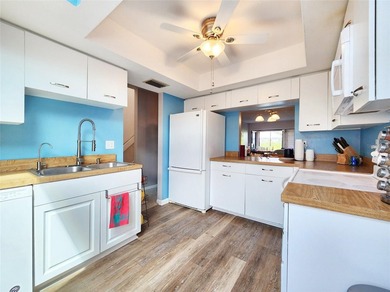 More than a condo, it's a waterfront lifestyle. Located in the - photo 8