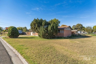 Welcome to Indiana Avenue. This charming brick home sits on a