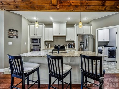 Builder's custom lakefront double lot retreat, showcasing - photo 11