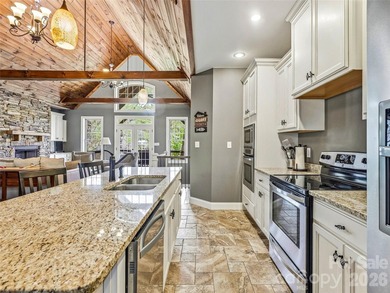Builder's custom lakefront double lot retreat, showcasing - photo 13