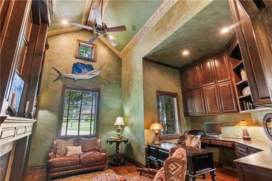 This custom estate sits on a rare 1.4-acre wooded lot backing to - photo 15