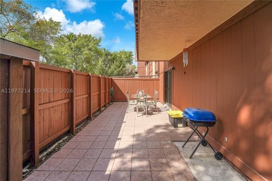 Tucked within the lush, gated community of Snapper Village, this - photo 15