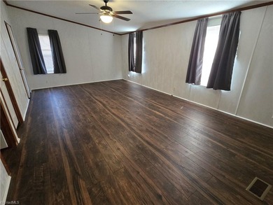 This spacious home with an acre lot and no neighbors close by