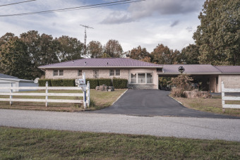 Charming home in Lakefront Subdivision - Lake Home For Sale in McDaniels, Kentucky