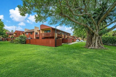 Tucked within the lush, gated community of Snapper Village, this - photo 24