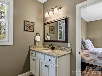Builder's custom lakefront double lot retreat, showcasing - photo 25