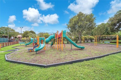 Tucked within the lush, gated community of Snapper Village, this - photo 28