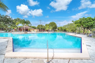 Tucked within the lush, gated community of Snapper Village, this - photo 29