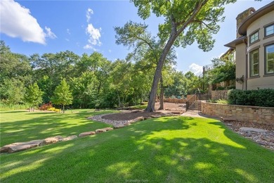 This custom estate sits on a rare 1.4-acre wooded lot backing to - photo 39