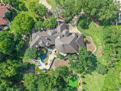 This custom estate sits on a rare 1.4-acre wooded lot backing to - photo 44