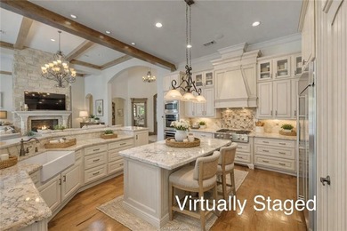 This custom estate sits on a rare 1.4-acre wooded lot backing to - photo 47