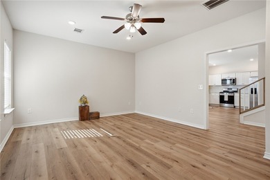 Nestled inside a desirable gated community, this beautifully