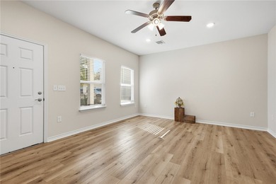 Nestled inside a desirable gated community, this beautifully