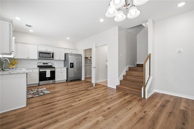 Nestled inside a desirable gated community, this beautifully