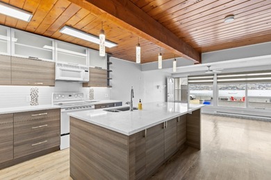 Lakeshore life meets incredible value in this turnkey townhome - photo 11