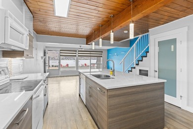 Lakeshore life meets incredible value in this turnkey townhome - photo 13