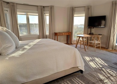 A rare and compelling offering along coveted Dune Road, this - photo 12