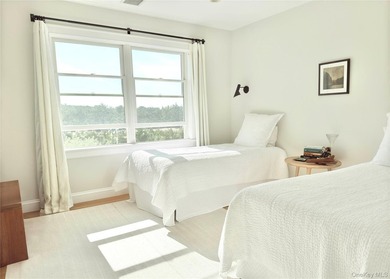 A rare and compelling offering along coveted Dune Road, this - photo 15