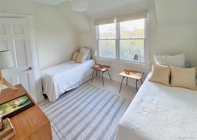 A rare and compelling offering along coveted Dune Road, this - photo 16