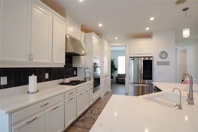Welcome to this stunning 4-bedroom, 3.5-bath home located in the - photo 7