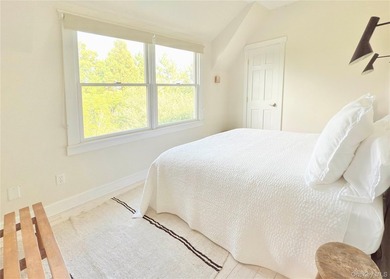 A rare and compelling offering along coveted Dune Road, this - photo 17