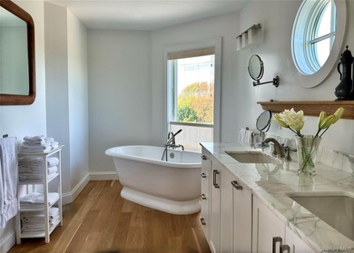 A rare and compelling offering along coveted Dune Road, this - photo 18