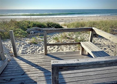 A rare and compelling offering along coveted Dune Road, this - photo 19
