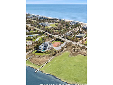 A rare and compelling offering along coveted Dune Road, this - photo 22