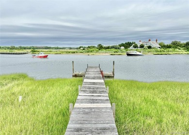 A rare and compelling offering along coveted Dune Road, this - photo 24