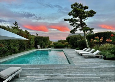 A rare and compelling offering along coveted Dune Road, this - photo 26