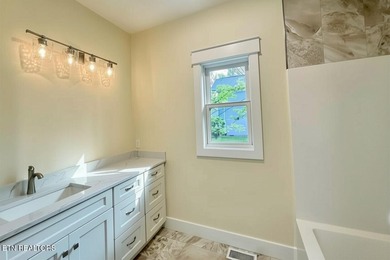 Stunning brick front New Construction! This 3 bedrooms, 2 bath - photo 18