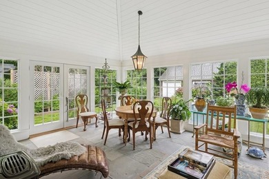 This Southampton Village Cape cod cottage encapsulates the - photo 19