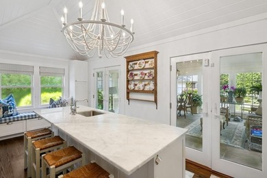 This Southampton Village Cape cod cottage encapsulates the - photo 25
