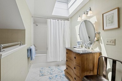 This Southampton Village Cape cod cottage encapsulates the - photo 26