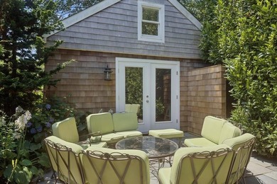 This Southampton Village Cape cod cottage encapsulates the - photo 32
