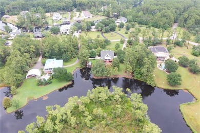 Beautiful waterfront home nestled on a private, tree-lined lot - photo 33