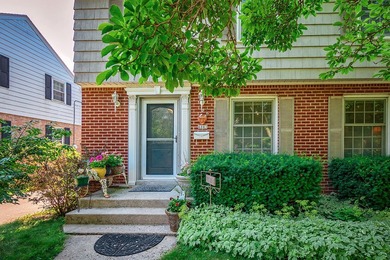 Your'e gonna love this handsome brick colonial nestled on a - photo 2