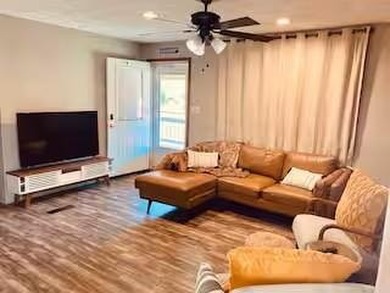 Enjoy a beautiful lake view from multiple outdoor seating areas - photo 15