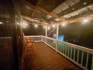 Enjoy a beautiful lake view from multiple outdoor seating areas - photo 25