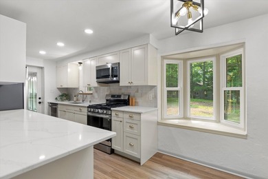 Perched on a private wooded hill with seasonal views of Silver - photo 9