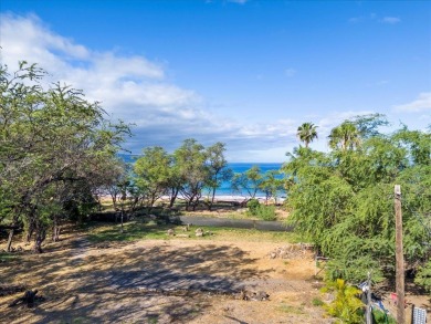 A rare chance to own Makena beachfront property awaits! Nestled