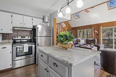 SELLER IS OFFERING $20,000 REMODEL ALLOWANCE. Tucked away on the - photo 13