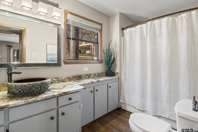 SELLER IS OFFERING $20,000 REMODEL ALLOWANCE. Tucked away on the - photo 16