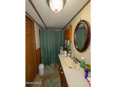 ATTENTION ALL CASH BUYERS! Welcome to this 3-bed, 2-bath 1991 - photo 24