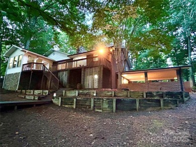 Attractive Lake Tillery brick home on a large gently sloping - Lake Home Sale Pending in Mount Gilead, North Carolina